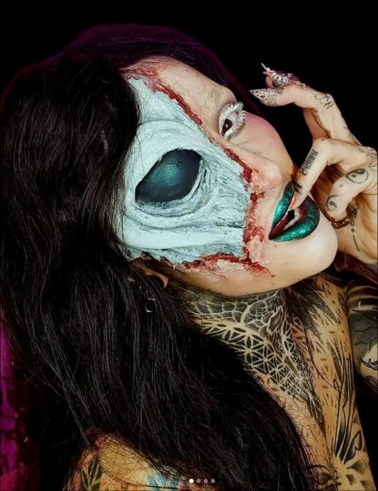 Half face alien prosthetic 
