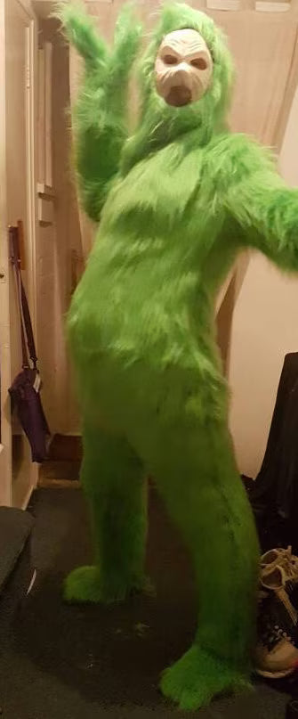 Olive green faux fur onesie costume, Grinch-inspired fancy dress cosplay set.