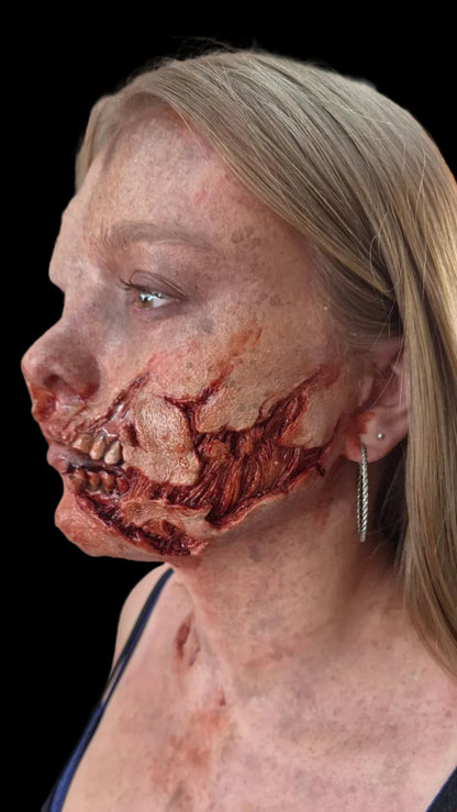 Exposed teeth zombie rot prosthetic appliance for realistic Halloween, film, TV and special effects zombie makeup.
