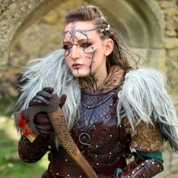 Viking shield maiden-themed creative event featuring body paint and makeup artistry in Leicester.